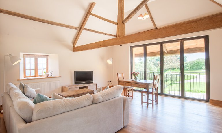 Living area with floor to ceiling windows